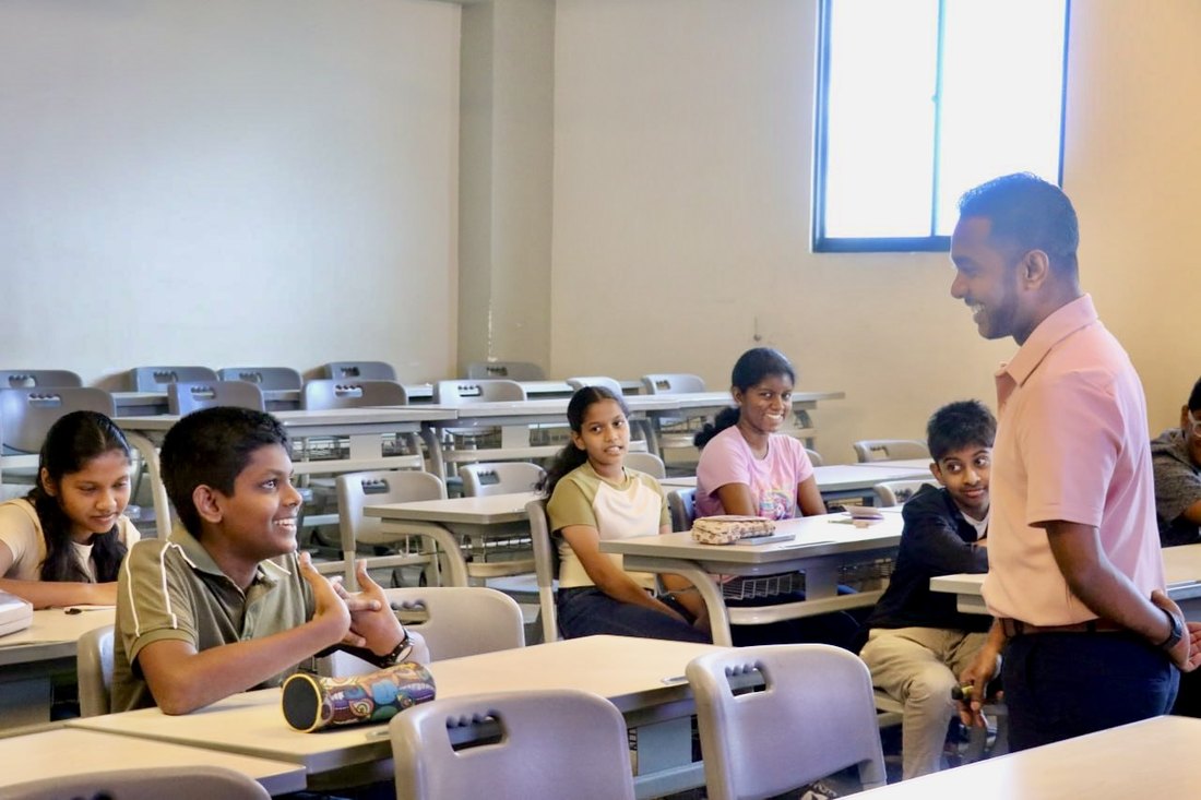 Students laughing during a leadership session at Lyceum International School